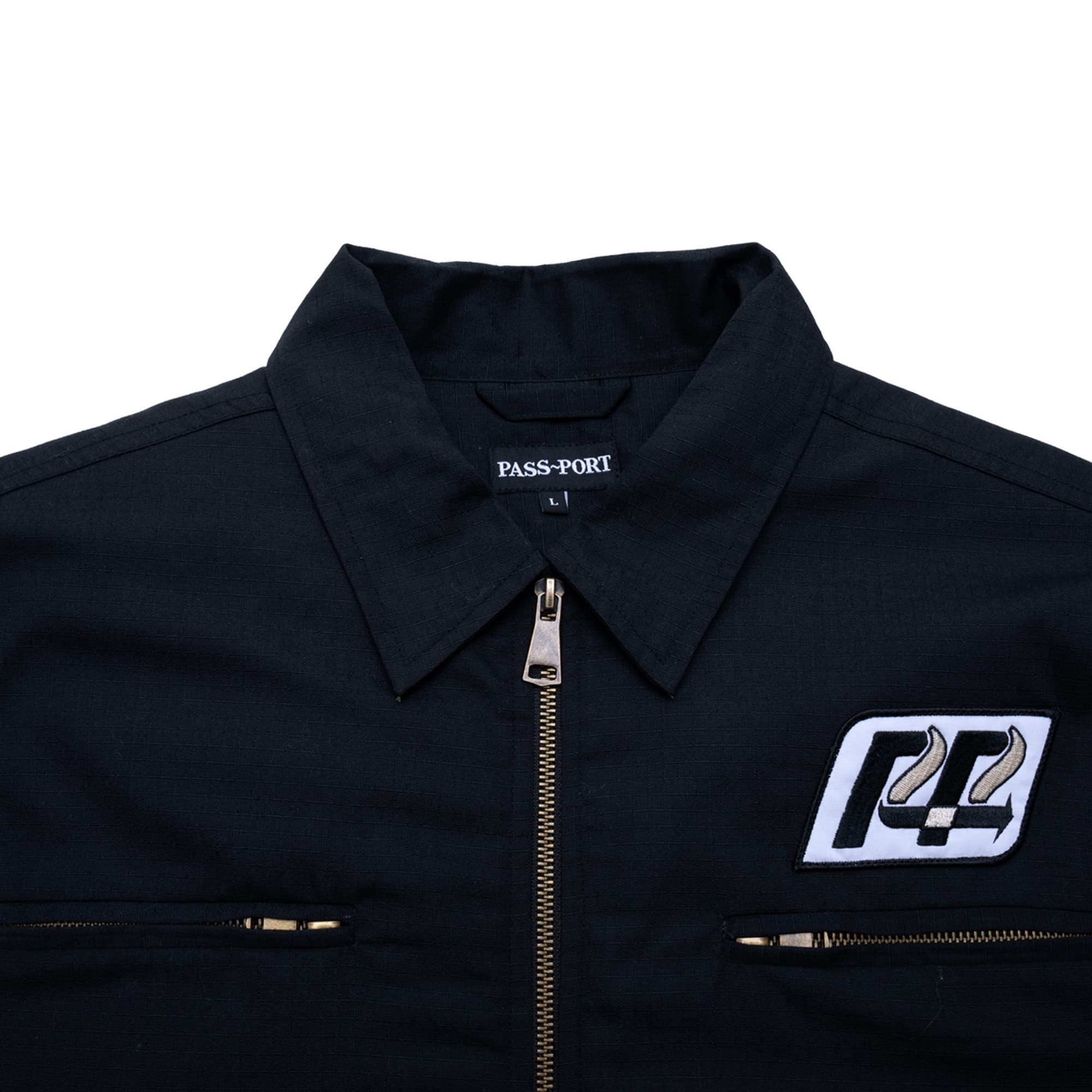 https://admin.plaze-shop.de/wp-content/uploads/2023/09/Passport_Transport-Ripstop-Delivery-Jacket_black_plaze-skateshop_3.jpg