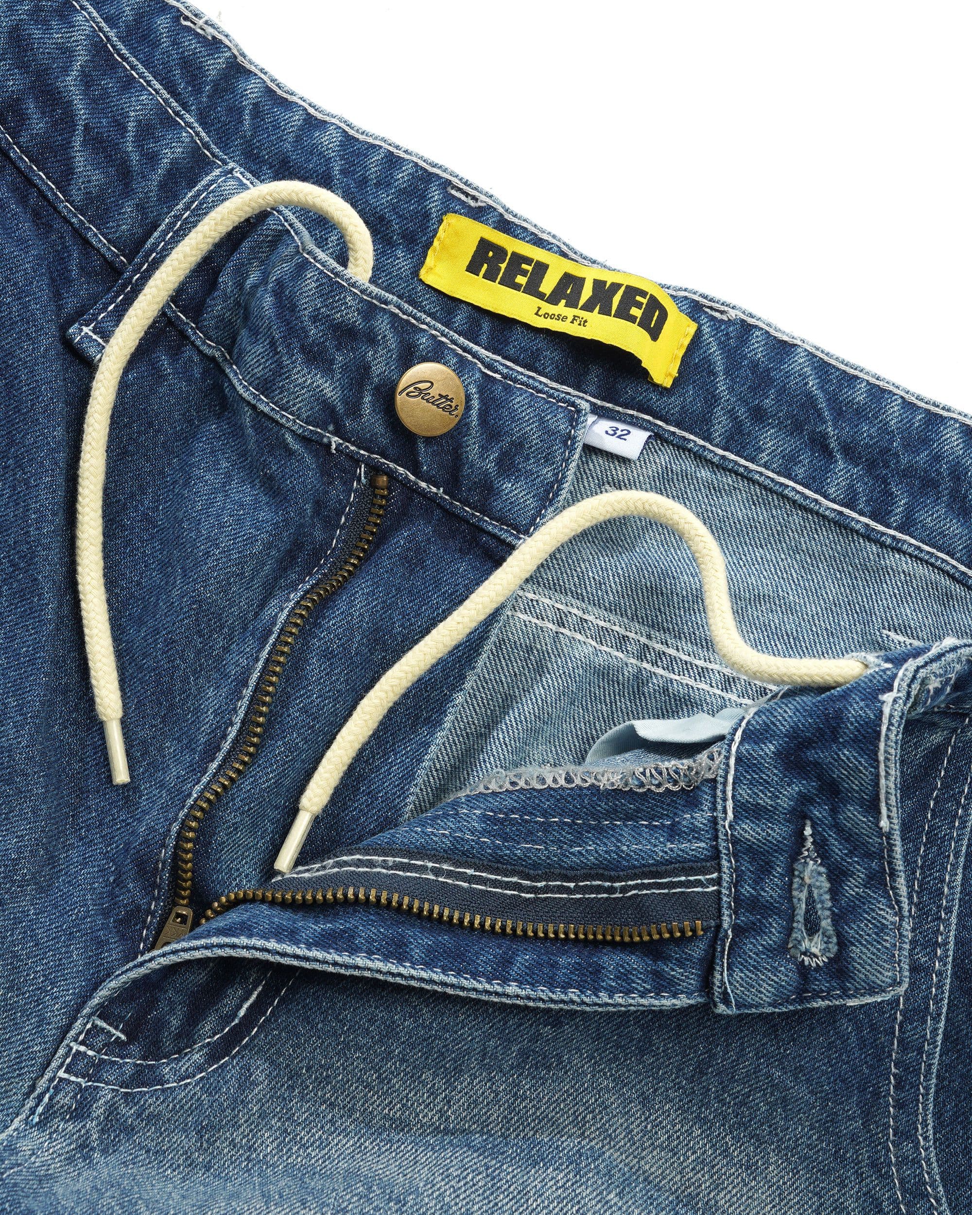 https://admin.plaze-shop.de/wp-content/uploads/2025/02/Buttergoods_Alpine_Denim_Jeans_Distressed_Faded_Blue_plaze-shop_1-4.jpg