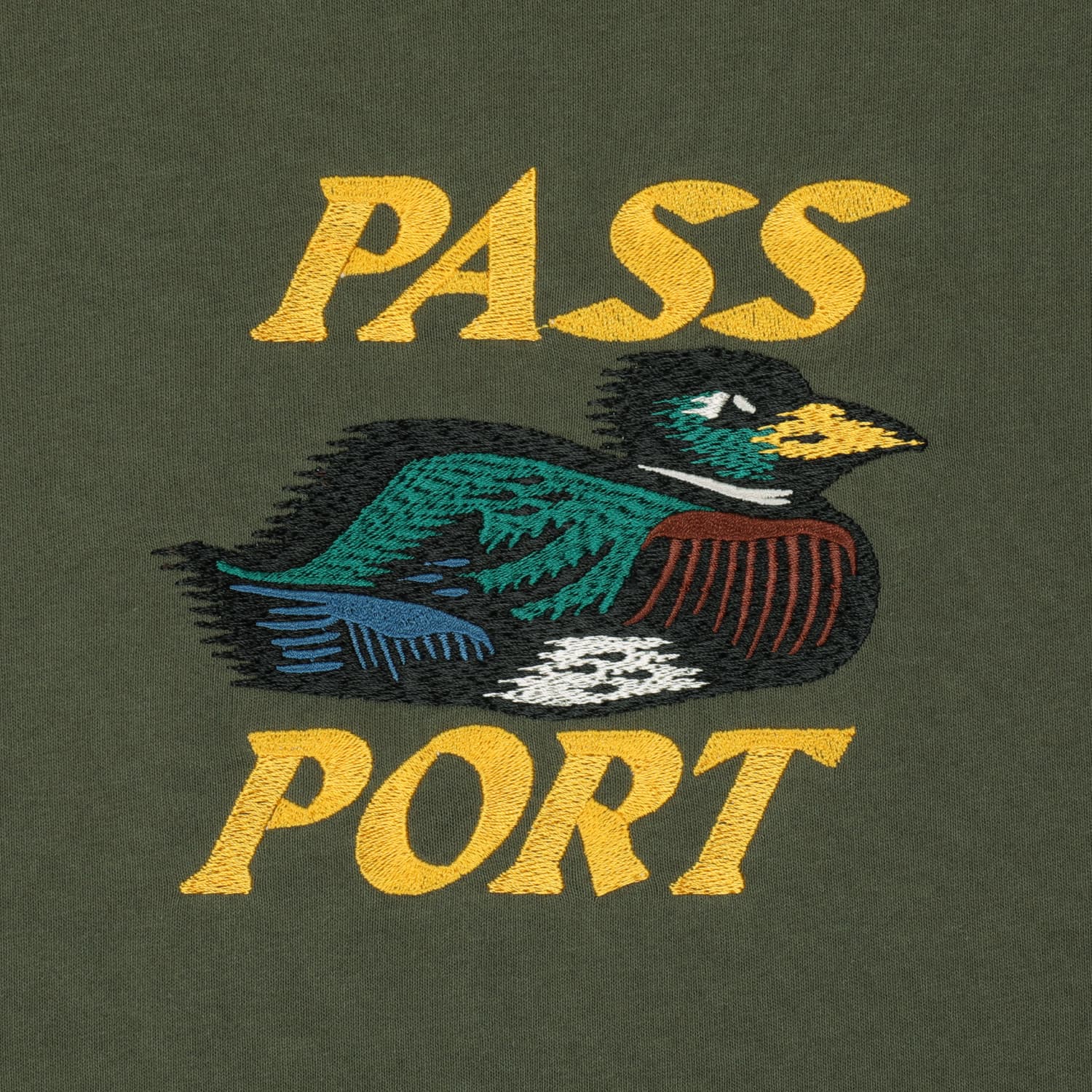 https://admin.plaze-shop.de/wp-content/uploads/2025/03/Pass_Port_Fast_Duck_Tee_Olive_plaze-shop_1-3.jpg