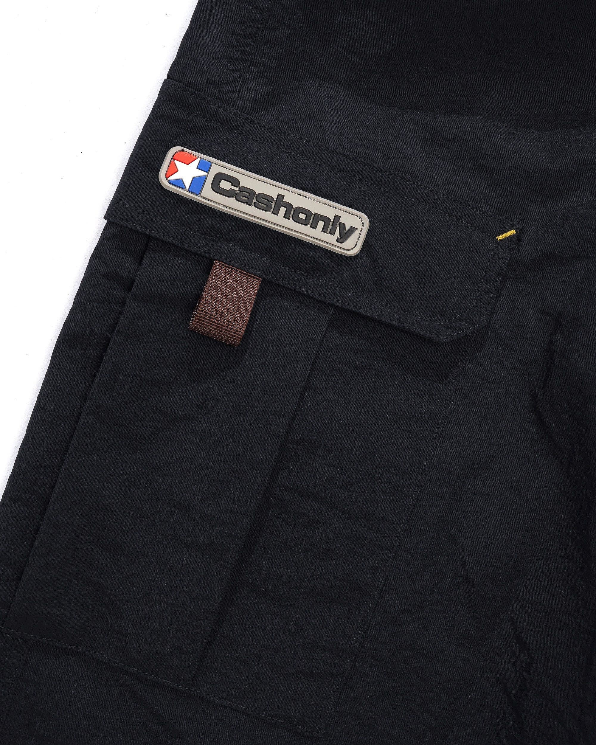 https://admin.plaze-shop.de/wp-content/uploads/2025/07/Star-Cargo-Pants-Black-3.jpg