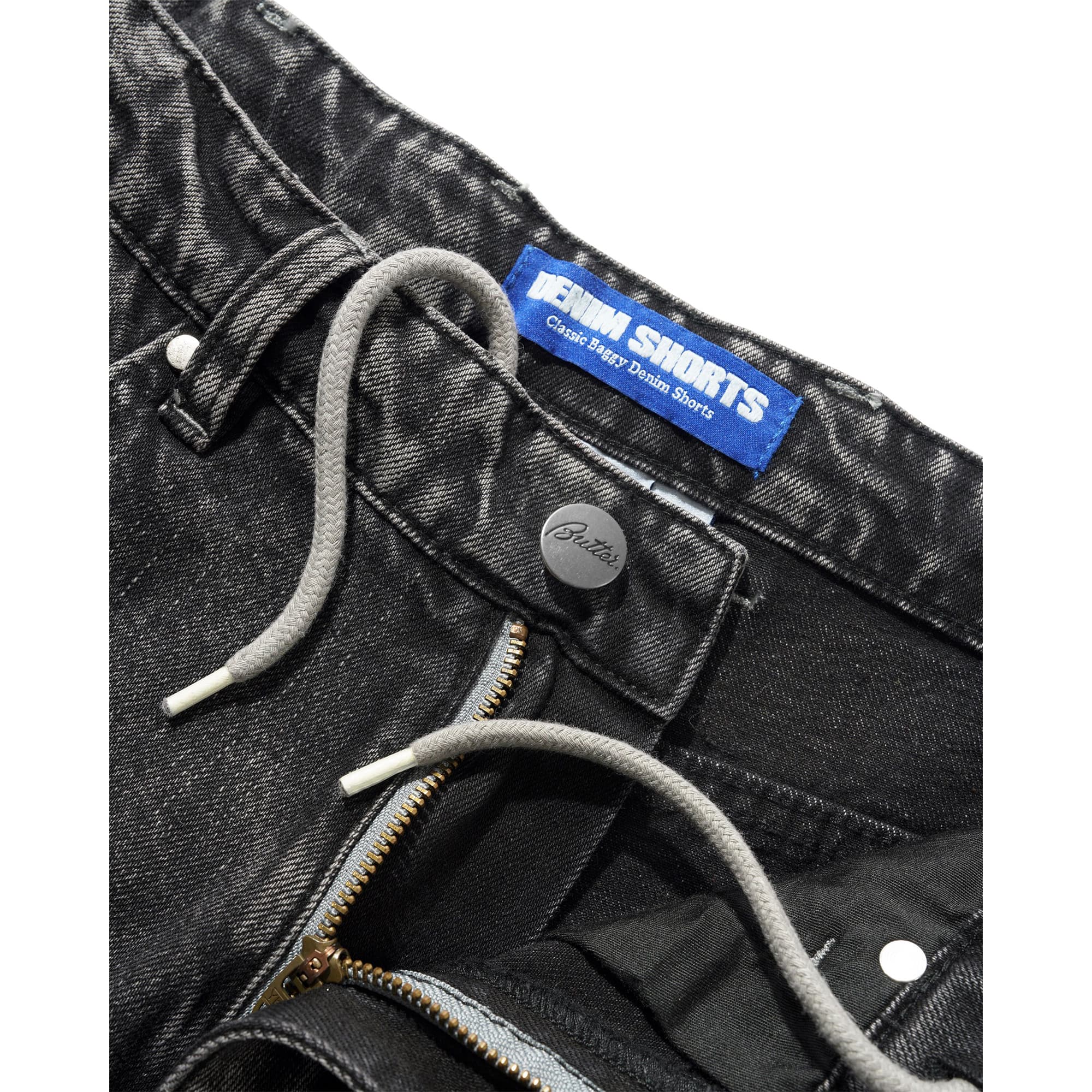 https://admin.plaze-shop.de/wp-content/uploads/2026/05/Buttergoods_drummer_baggy_denim_streaky_black_plaze-skateshop5.jpg