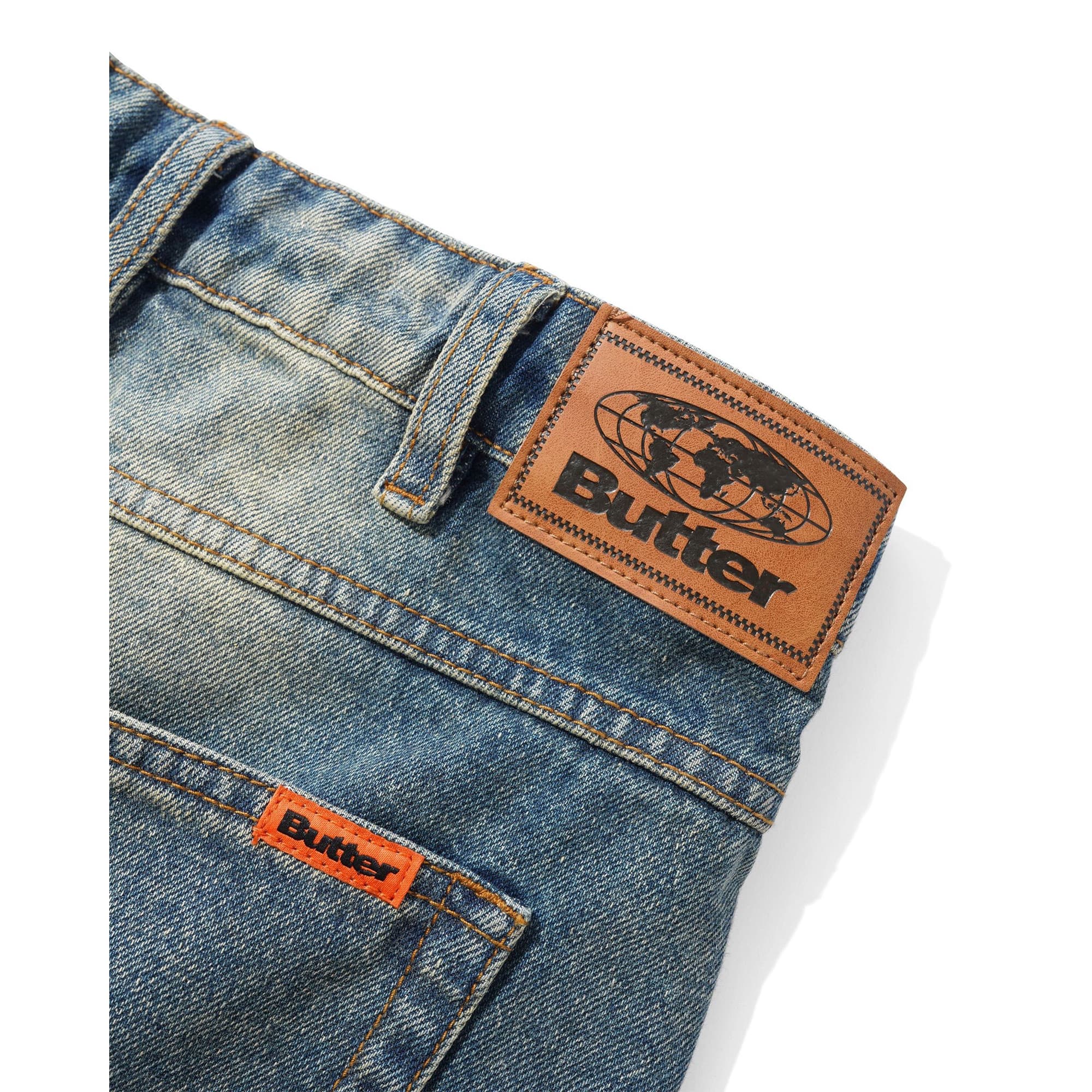 https://admin.plaze-shop.de/wp-content/uploads/2026/09/buttergoods_relaxed_denim_jeans_distressed_mid_blue_plaze-skateshop5.jpg